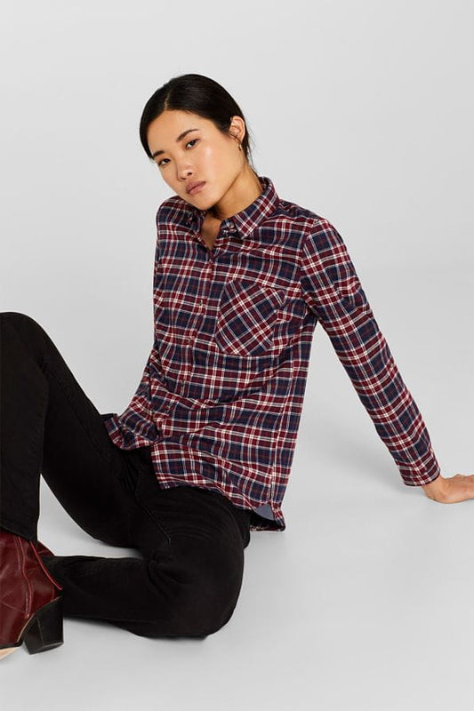 La brusa perfecta la tens ja, però aquesta de quadres de ARCmoda la necessites
