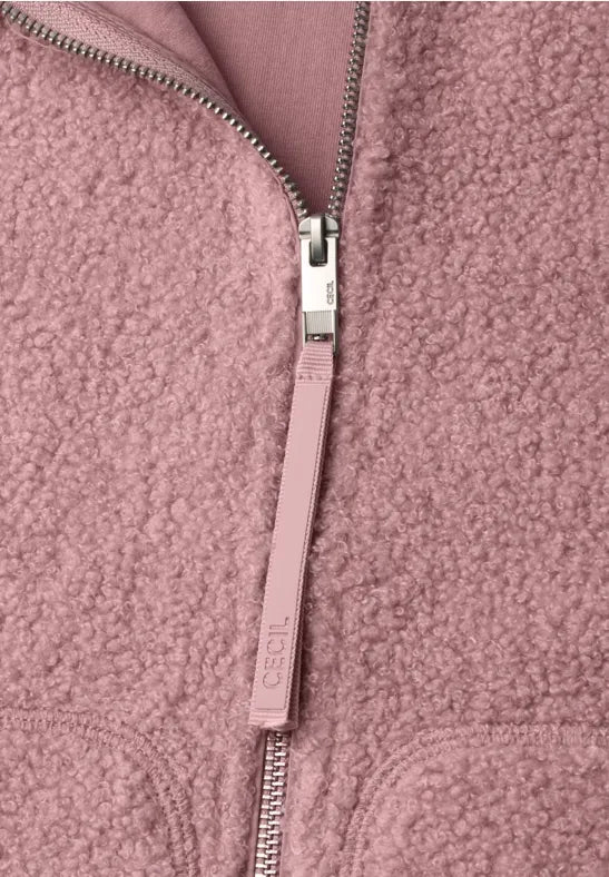 Chaqueta de borreguito con cuello alto y cremallera en color rosa
