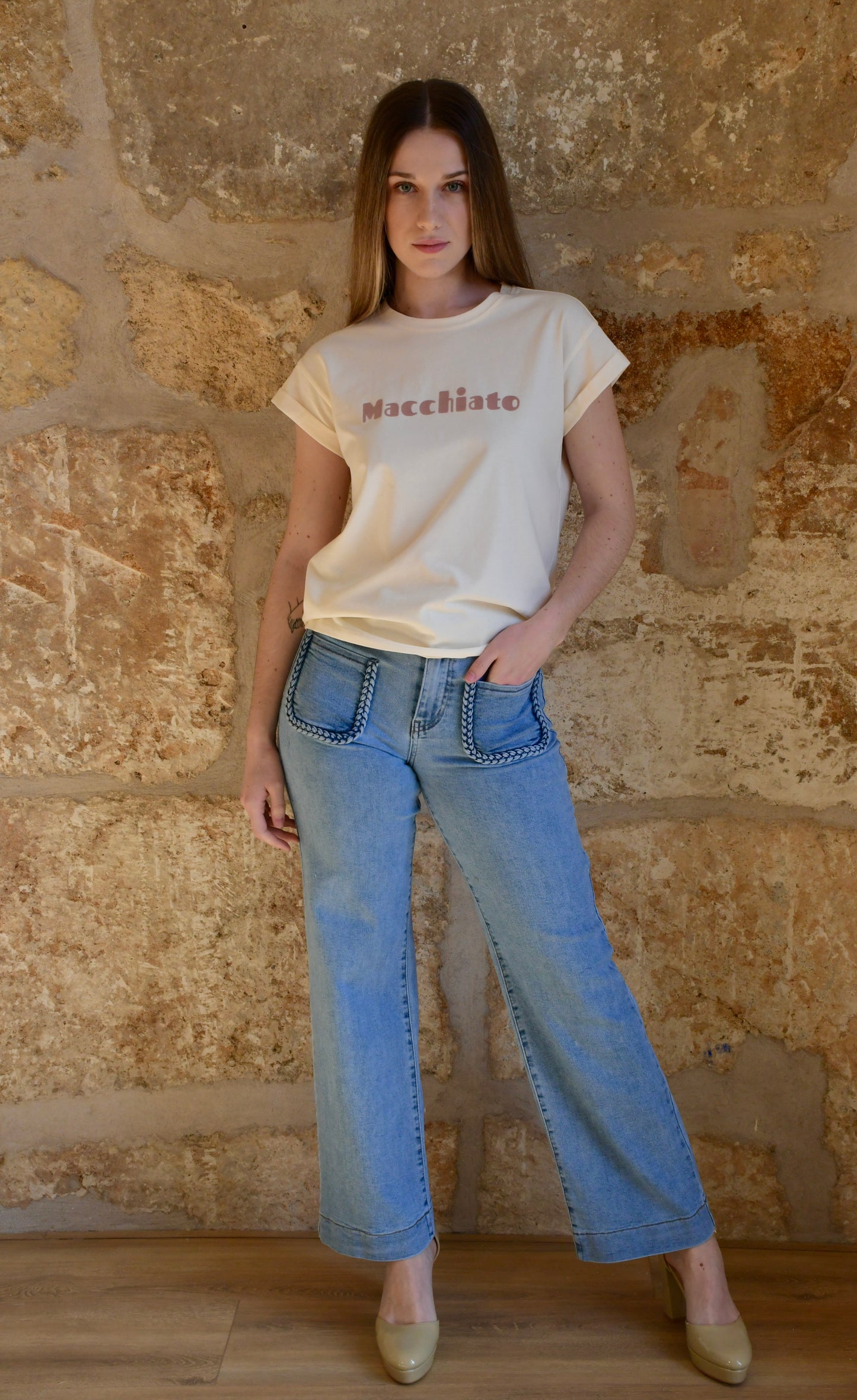 Pantalón vaquero con bolsillos delanteros trenzados