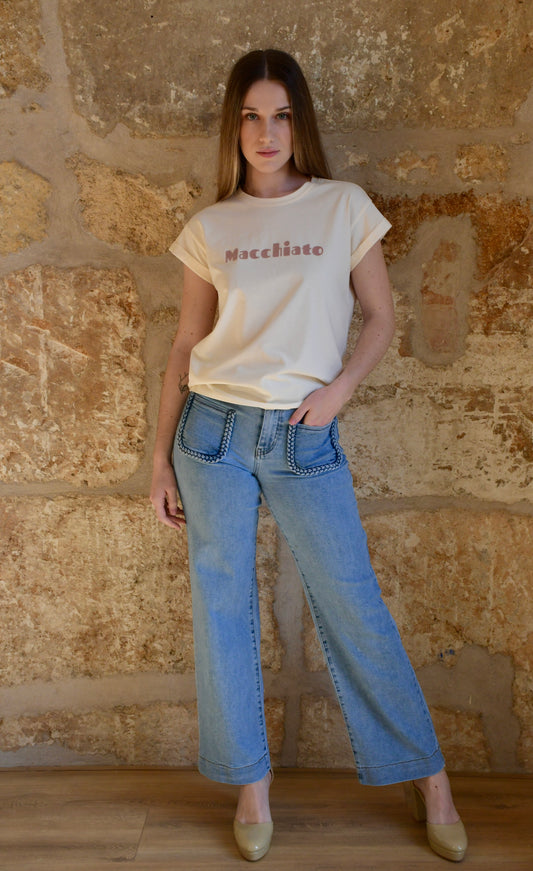 Pantalón vaquero con bolsillos delanteros trenzados