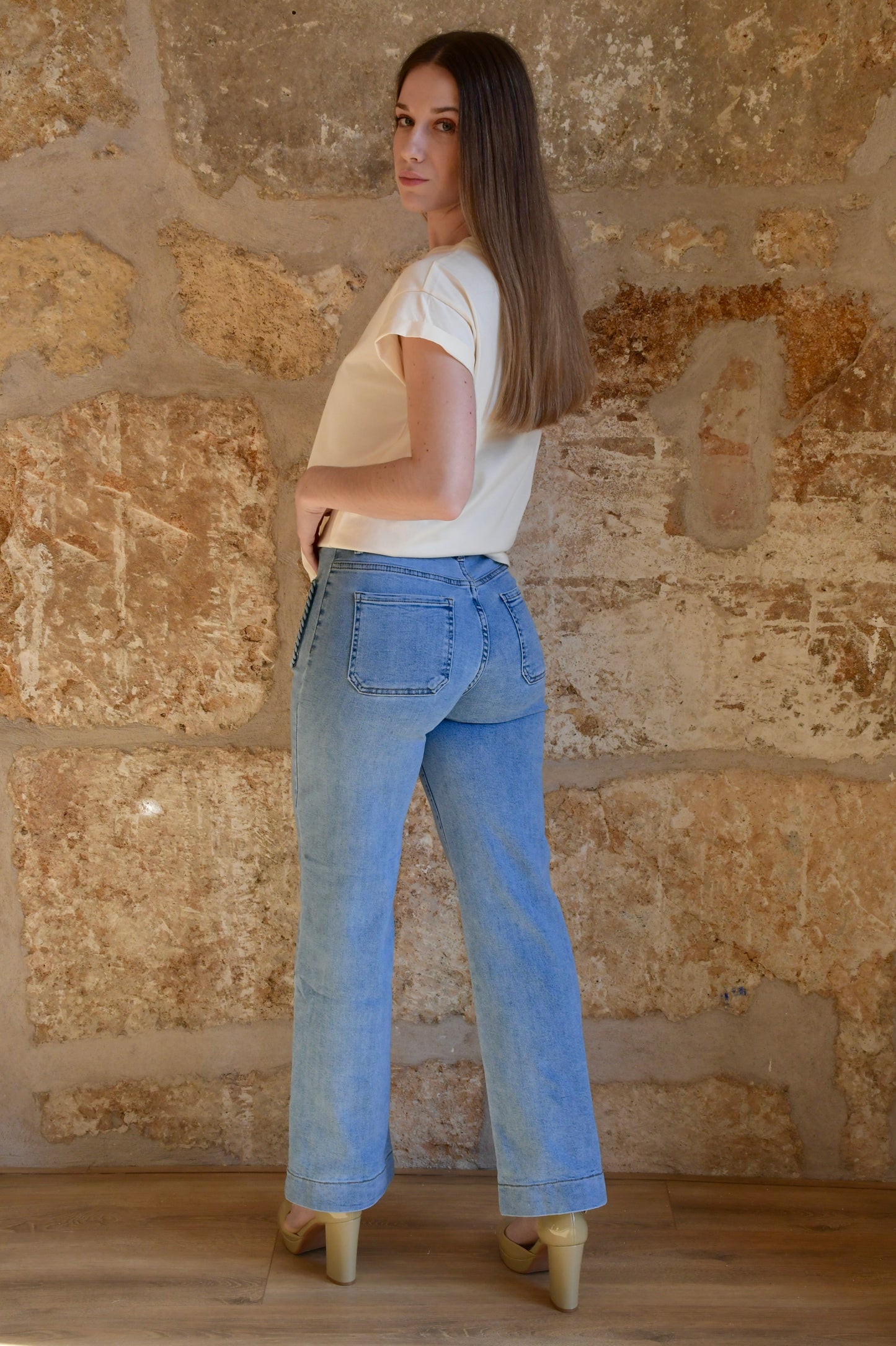 Pantalón vaquero con bolsillos delanteros trenzados